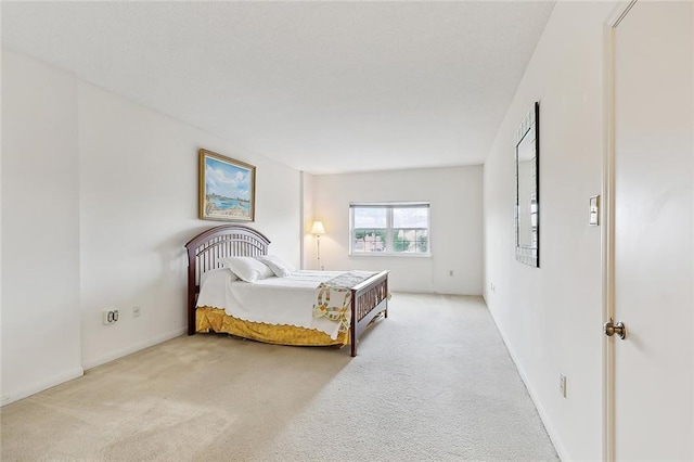 bedroom featuring carpet