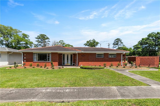 5942 Warwick Ct, New Orleans, LA 70131 - ranch-style home with french doors and a front lawn