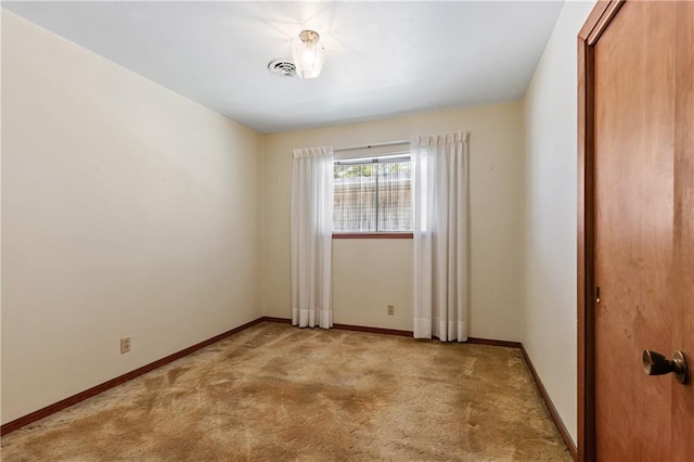 view of carpeted spare room