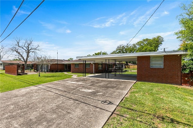 single story home with a carport and a front yard