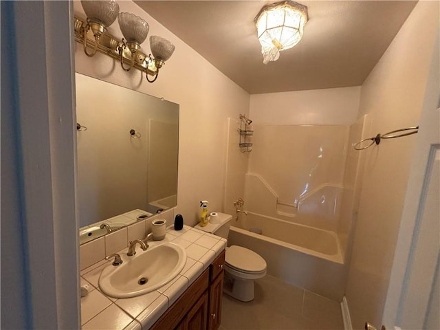 full bathroom with tile flooring, shower / bathing tub combination, vanity, and toilet