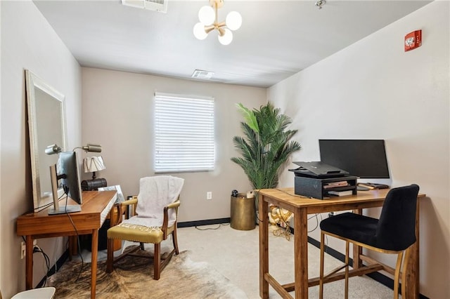 office area featuring carpet floors and an inviting chandelier