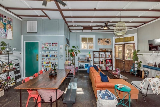 interior space with plenty of natural light and ceiling fan