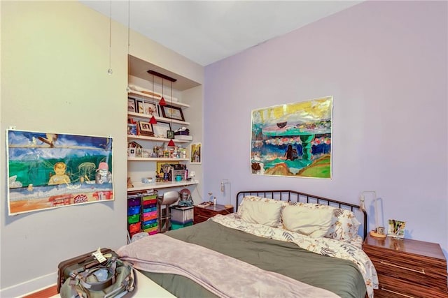 bedroom featuring wood-type flooring