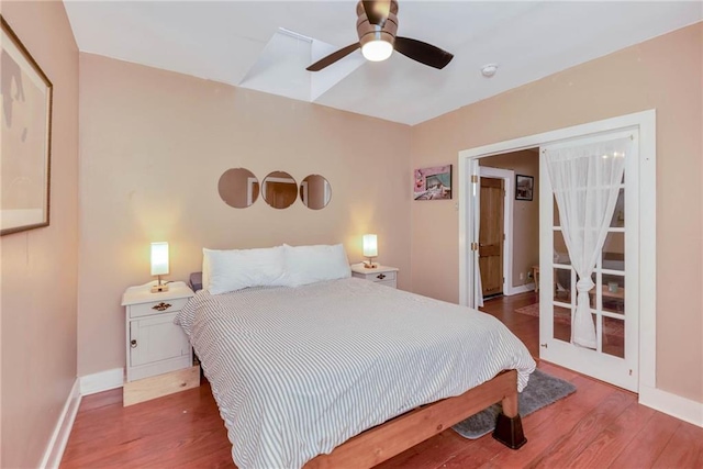 bedroom featuring ceiling fan and hardwood / wood-style flooring