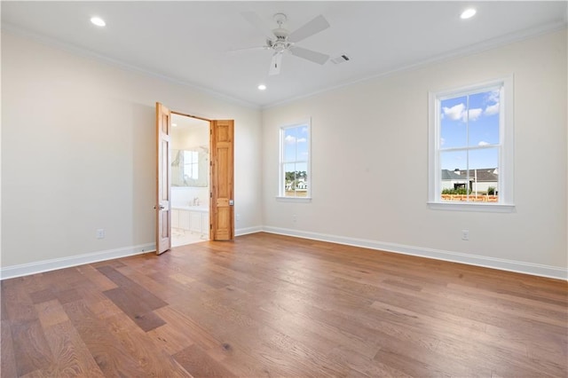 unfurnished bedroom featuring connected bathroom, ceiling fan, and crown molding