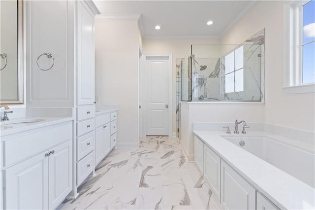 bathroom featuring crown molding, vanity, and independent shower and bath