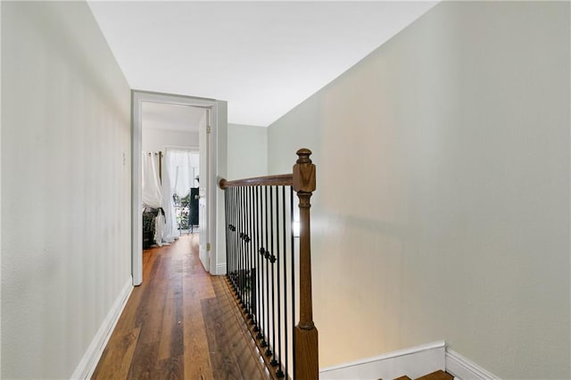 hallway featuring dark hardwood / wood-style floors