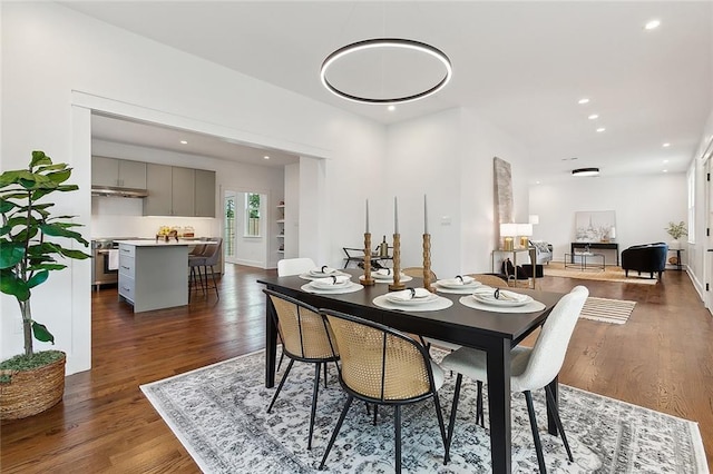 dining room featuring dark hardwood / wood-style flooring