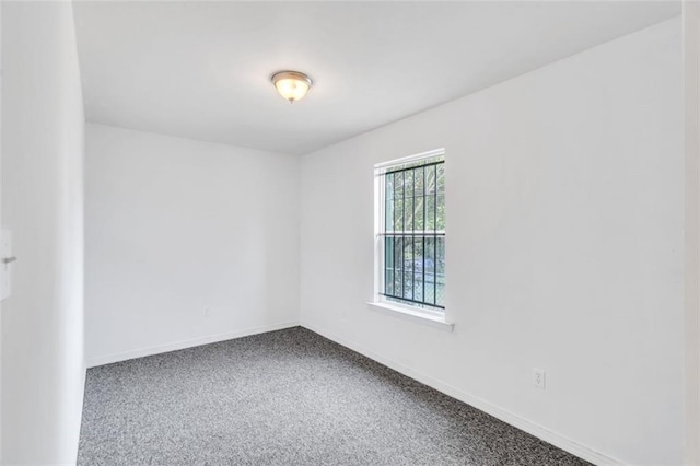 spare room with carpet flooring