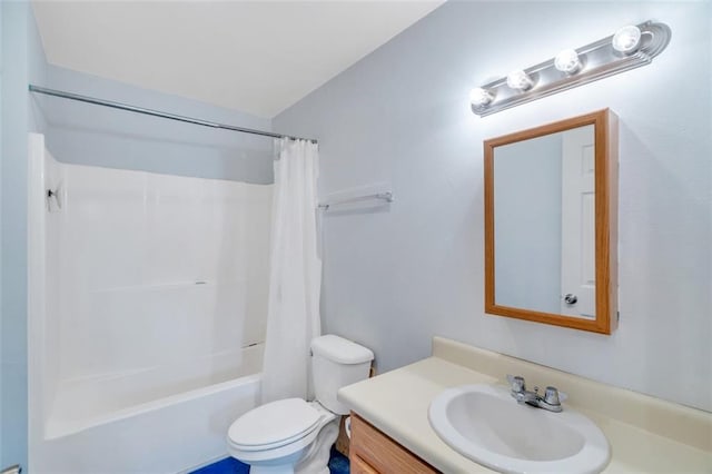 full bathroom featuring vanity, toilet, and shower / bath combo with shower curtain