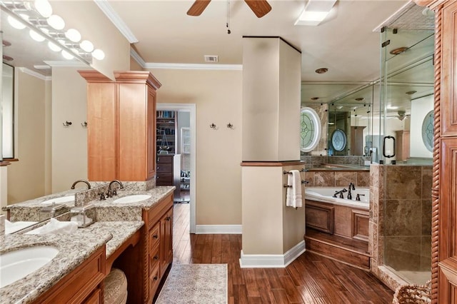 bathroom featuring wood-type flooring, vanity, independent shower and bath, and crown molding