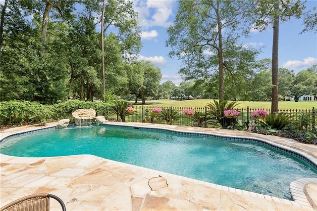 view of swimming pool featuring a patio and pool water feature