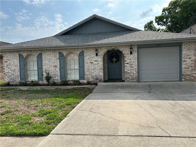 view of front of property featuring a garage