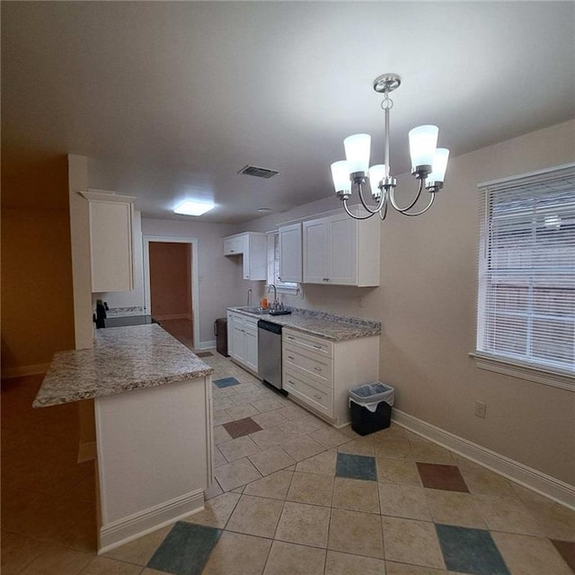 kitchen with white cabinetry, an inviting chandelier, light tile flooring, and stainless steel dishwasher