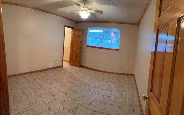 unfurnished room featuring crown molding, a textured ceiling, ceiling fan, and light tile floors