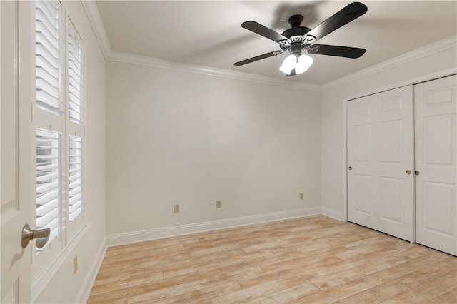 unfurnished bedroom featuring a closet, ceiling fan, crown molding, and light hardwood / wood-style flooring