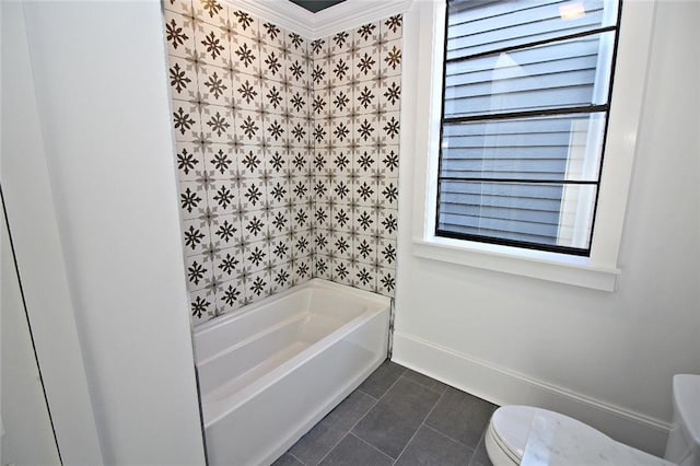 bathroom with tile floors, toilet, and ornamental molding