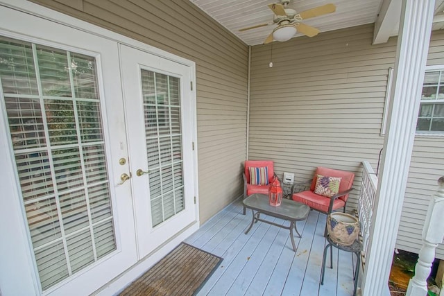 wooden deck with ceiling fan