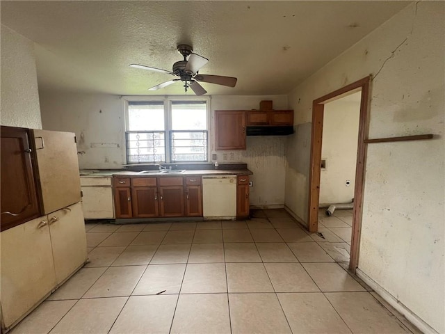 kitchen featuring ventilation hood, light tile flooring, white dishwasher, sink, and ceiling fan