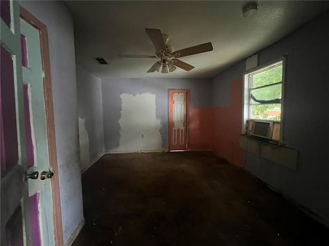 unfurnished room featuring ceiling fan