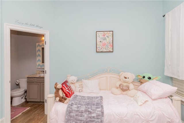 bedroom featuring dark hardwood / wood-style flooring