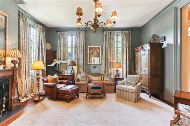 living area featuring an inviting chandelier and ornamental molding