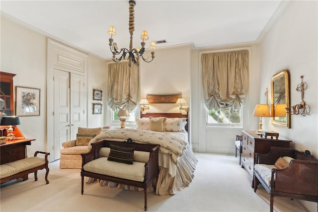 carpeted bedroom with a chandelier and ornamental molding