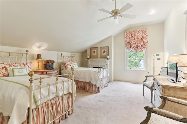 carpeted bedroom featuring lofted ceiling and ceiling fan