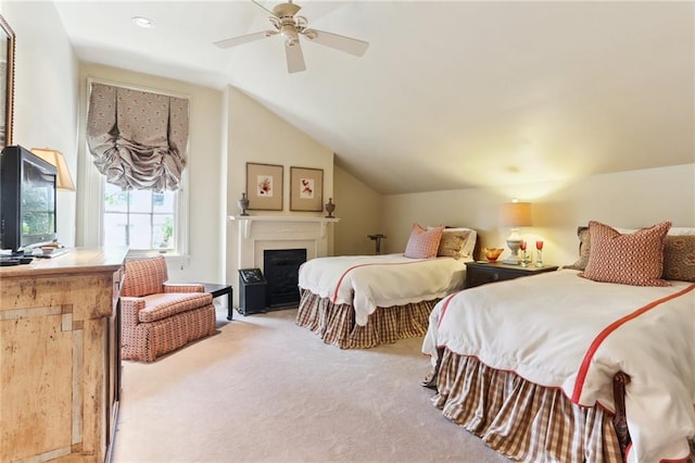 bedroom featuring ceiling fan, light carpet, and vaulted ceiling