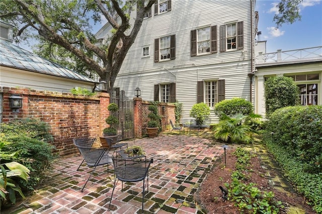 rear view of property with a patio