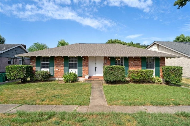 ranch-style house with a front lawn