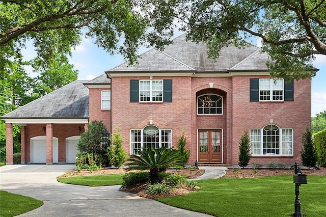 view of front of property featuring a front yard and french doors