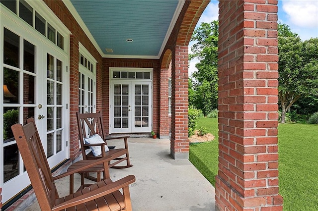 view of patio featuring french doors