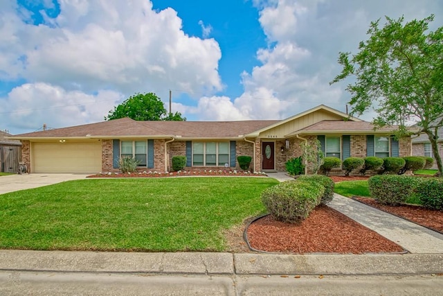 single story home featuring a garage and a front lawn