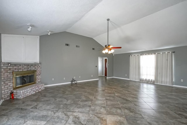 unfurnished living room featuring high vaulted ceiling, tile flooring, a brick fireplace, and ceiling fan