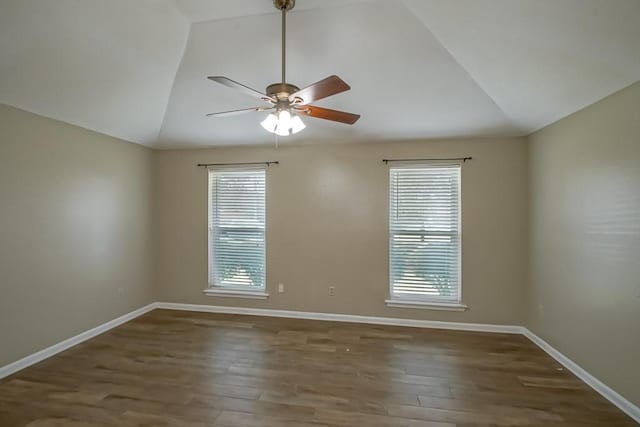2545 Kismet St, Marrero, LA 70072 - empty room featuring vaulted ceiling, ceiling fan, baseboards, and wood finished floors