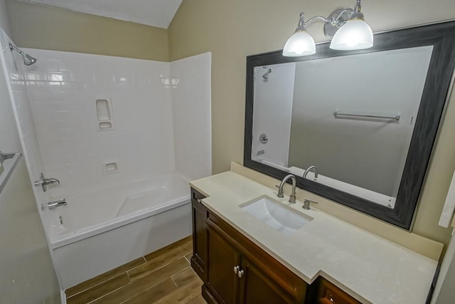 2545 Kismet St, Marrero, LA 70072 - full bathroom featuring wood finished floors, vanity, and bathtub / shower combination