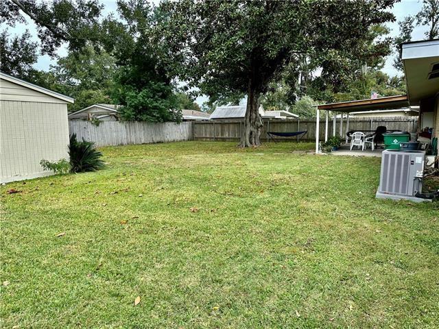 view of yard with central AC