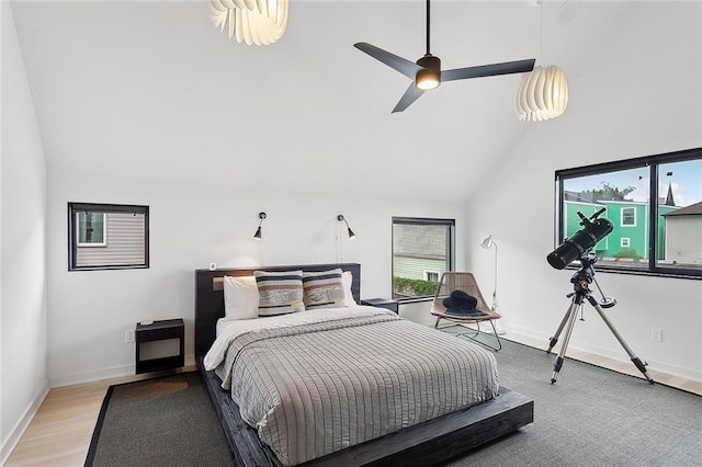 bedroom featuring vaulted ceiling, ceiling fan, and hardwood / wood-style flooring