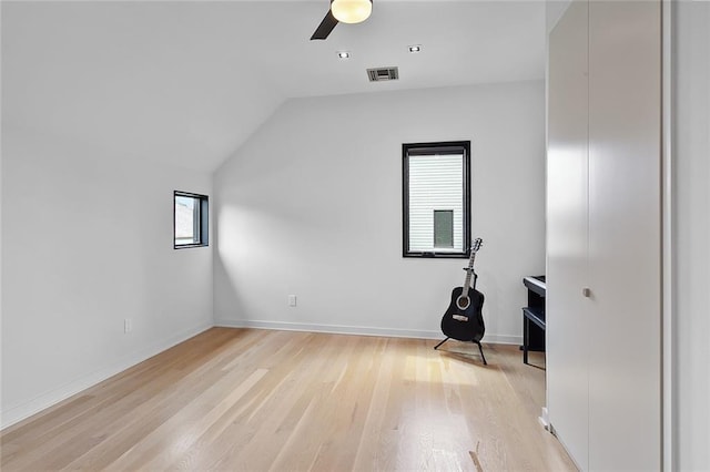 bonus room featuring ceiling fan, vaulted ceiling, and light hardwood / wood-style floors