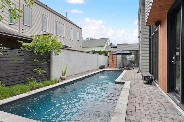 view of pool with a patio