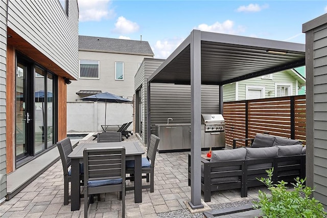 view of patio / terrace featuring an outdoor living space and a grill