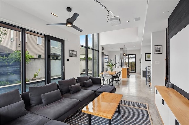 living room with ceiling fan