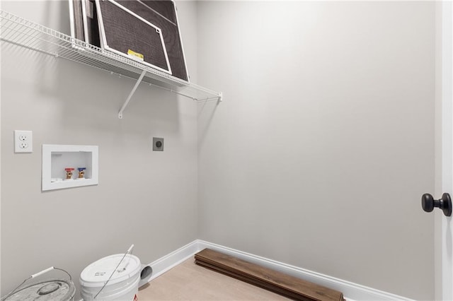 washroom with electric dryer hookup and hookup for a washing machine