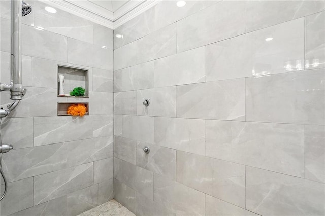 bathroom with tiled shower