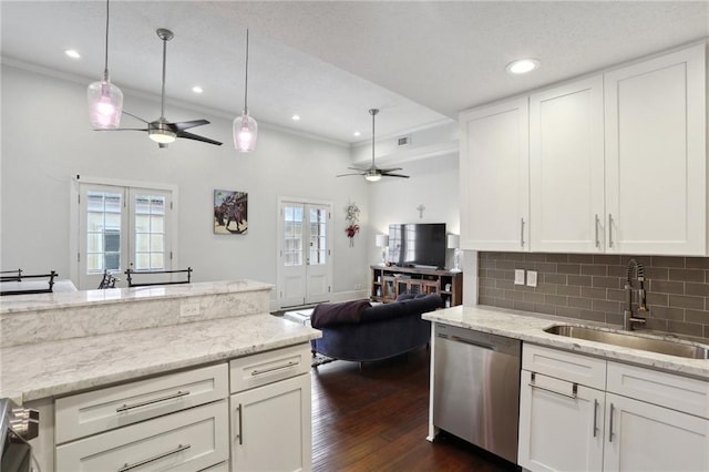 kitchen with hanging light fixtures, ceiling fan, sink, and stainless steel dishwasher