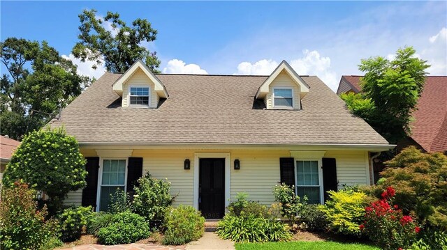 view of new england style home