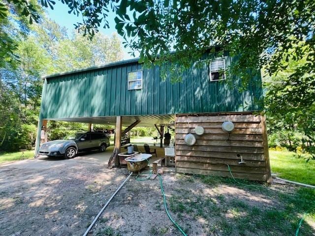 view of front of property with a carport