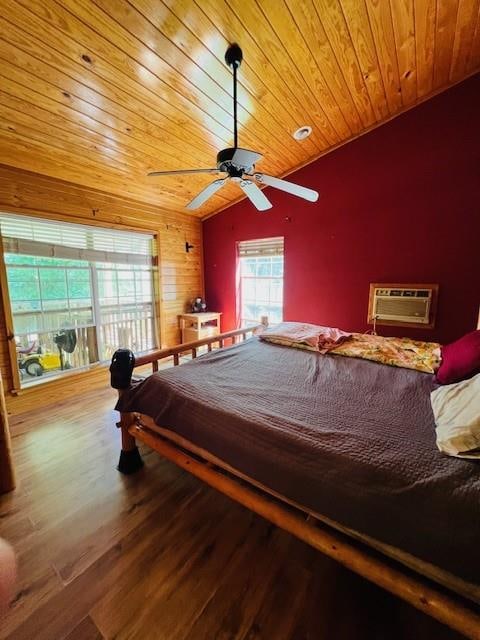 unfurnished bedroom with wooden ceiling, ceiling fan, hardwood / wood-style flooring, and vaulted ceiling